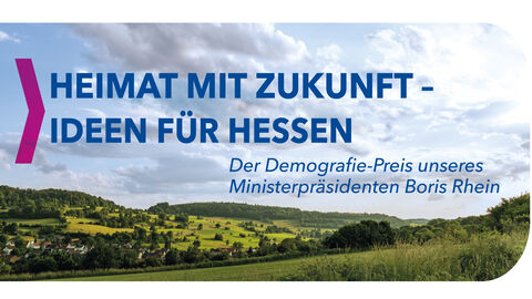 Grafik mit einem Bild, das ländlichen Raum zeigt, darauf der Text: „Heimat mit Zukunft – Ideen für Hessen Der Demografie-Preis unseres Ministerpräsidenten Boris Rhein“