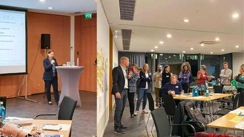 links Begrüßung durch Dr. Katharina Brauer am Rednerpult, rechts Teilnehmende sitzend und stehend an Gruppentischen